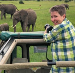 NJ Wight photographing elephants on safari.